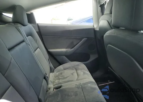 2023 Tesla Model Y from USA, damaged, VIN 7SAYGDEE4PF638471